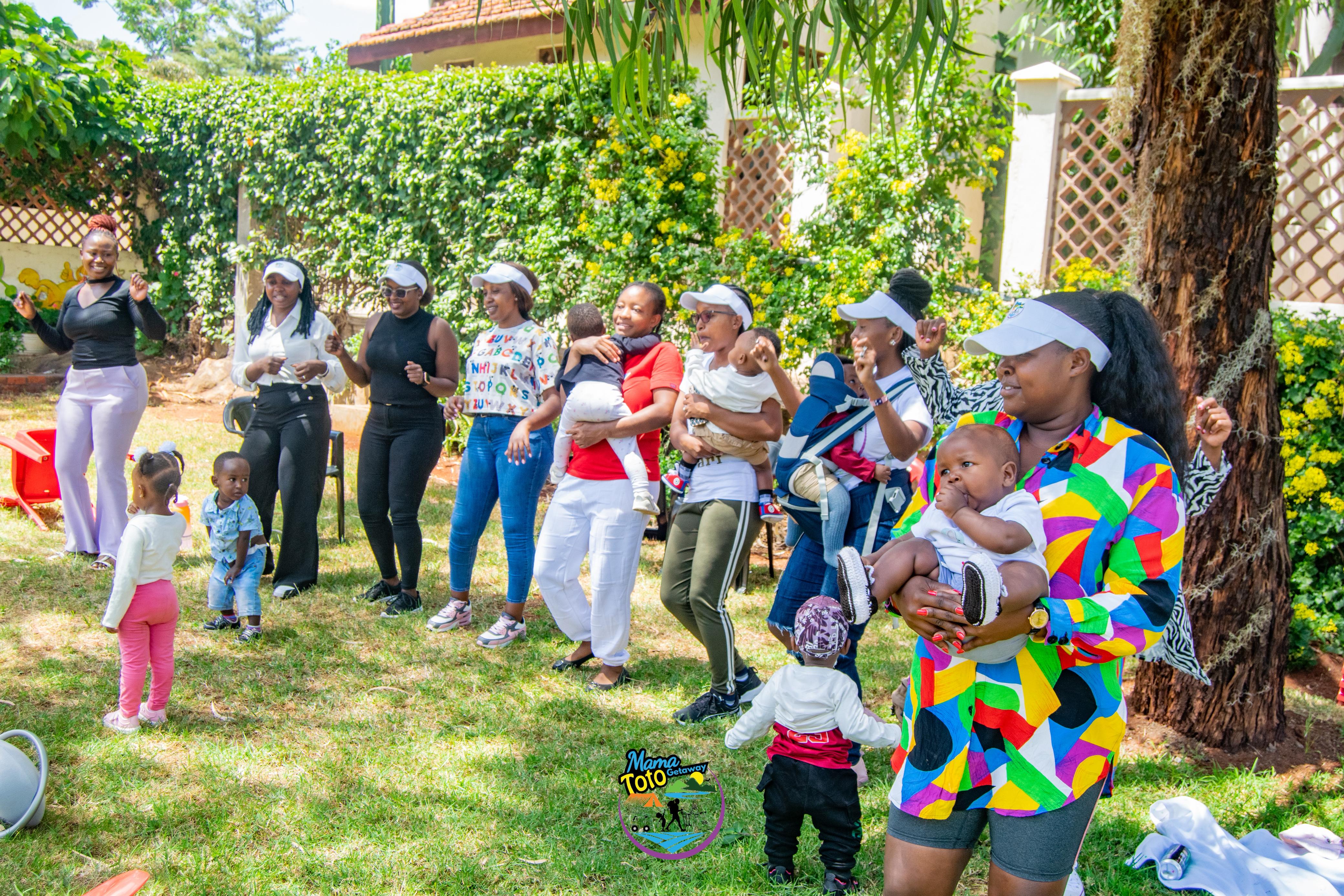 Group of moms and kids posing for a photo