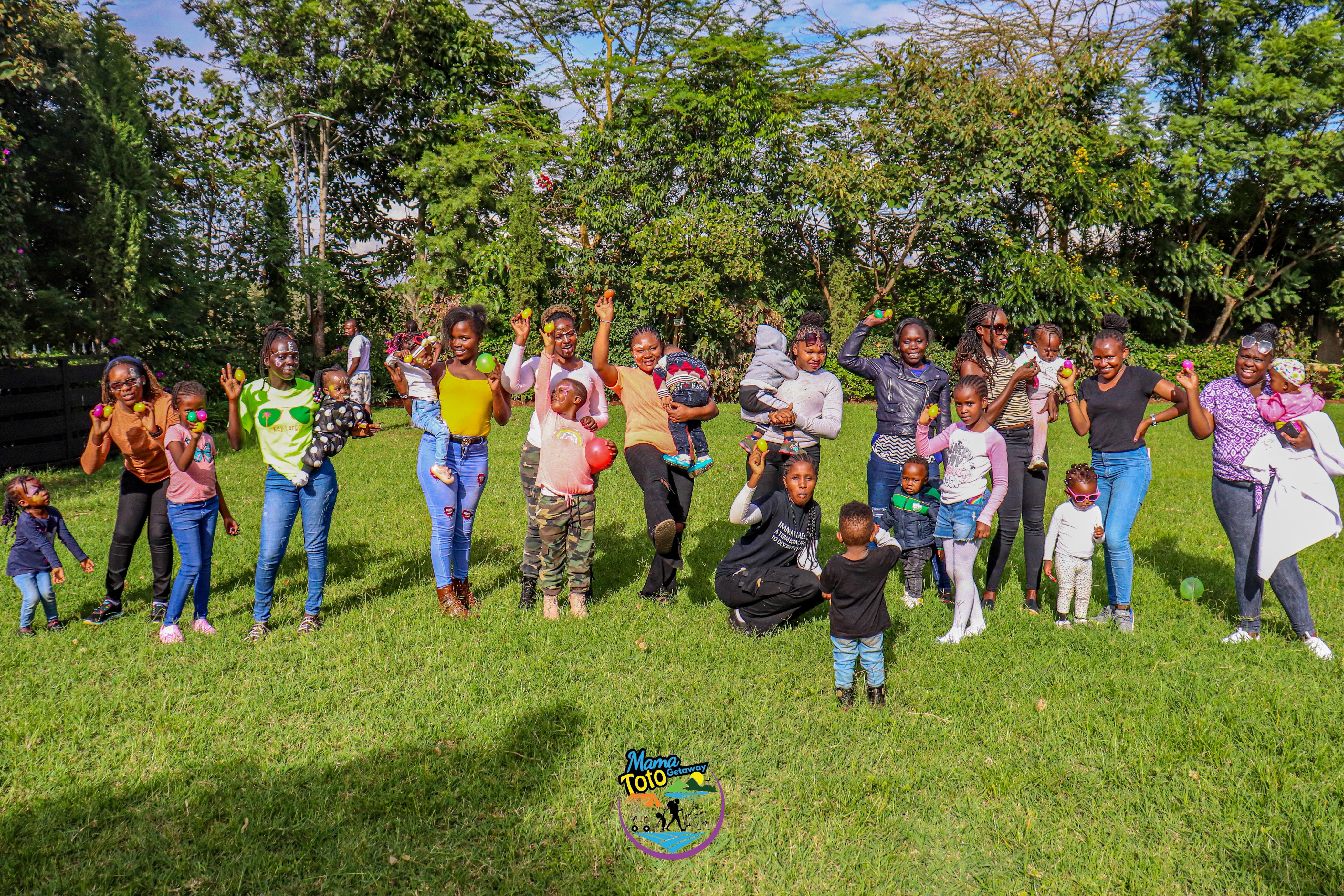 Moms and kids pose for a sunkissed photo